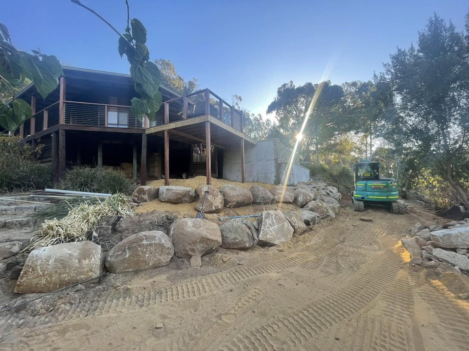 Rock retaining wall and levelled pad